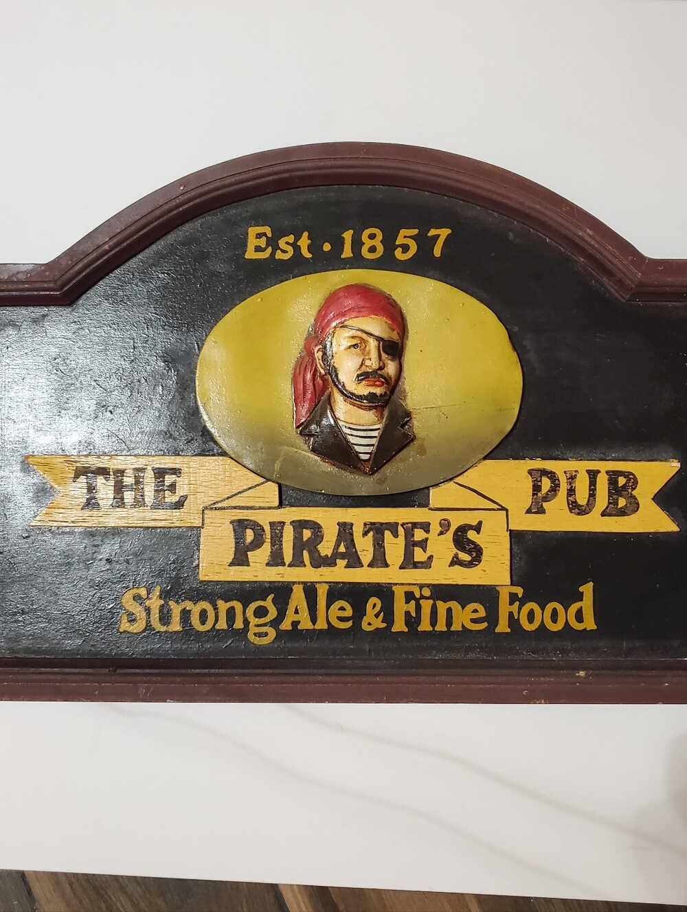 The Pirate's Pub Wall Sign in Black and Yellow